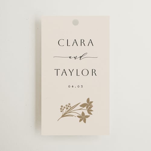 This is a champagne wedding favor tags with standard by Leah Bisch called floral border printing on signature in tag
