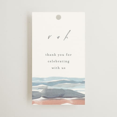 This is a beachy wedding favor tags with standard by Pixel and Hank called waves printing on signature in tag