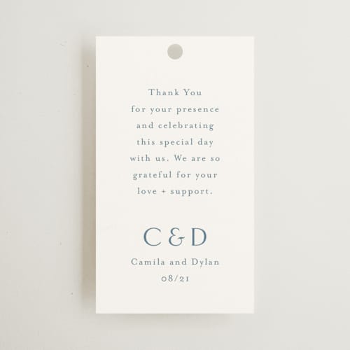 This is a dusty blue wedding favor tags with standard by Jennifer Postorino called graceful printing on signature in tag