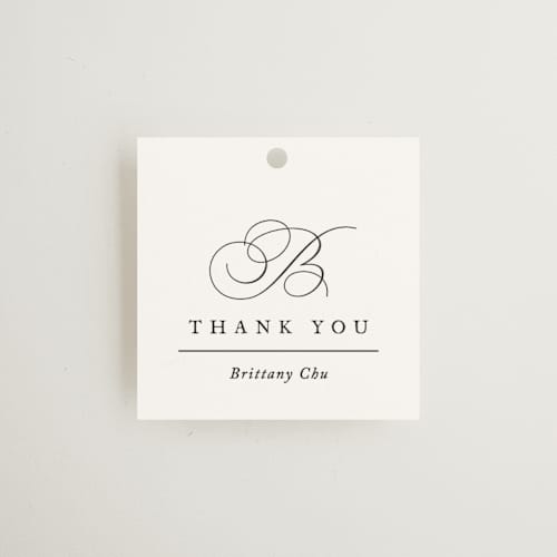 This is a pearl gift tags with standard by Jennifer Postorino called initial printing on signature in tag