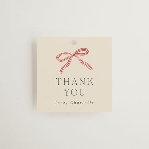 This is a eggnog gift tags with standard by Chris Griffith called ribbon stripe holiday printing on signature in tag