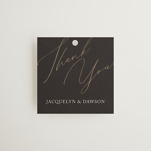 This is a cognac wedding favor tags with standard by Christie Garcia called sparkled toast printing on signature in tag