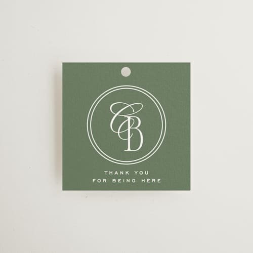 This is a moss wedding favor tags with standard by Kelly Schmidt called woods printing on signature in tag