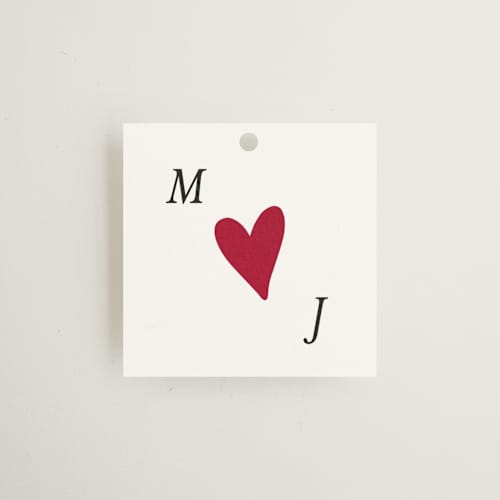 This is a snow wedding favor tags with standard by Ani Somi called amore printing on signature in tag