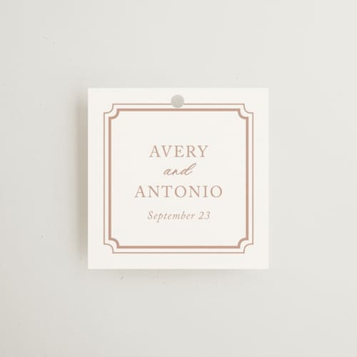 This is a dusty pink wedding favor tags with standard by Jennifer Postorino called avery printing on signature in tag