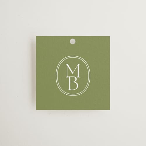 This is a moss wedding favor tags with standard by Megan Davis called perriand printing on signature in tag
