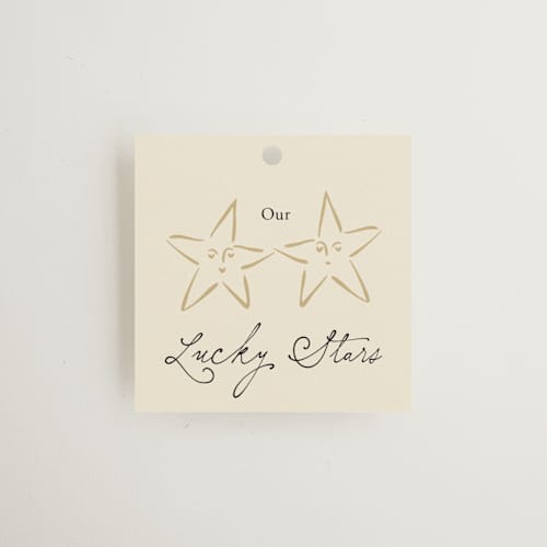 This is a noir wedding favor tags with standard by Ani Somi called written in the stars printing on signature in tag