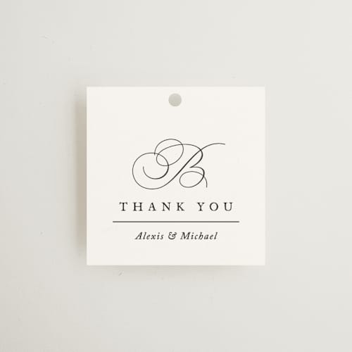This is a pearl wedding favor tags with standard by Jennifer Postorino called initial printing on signature in tag