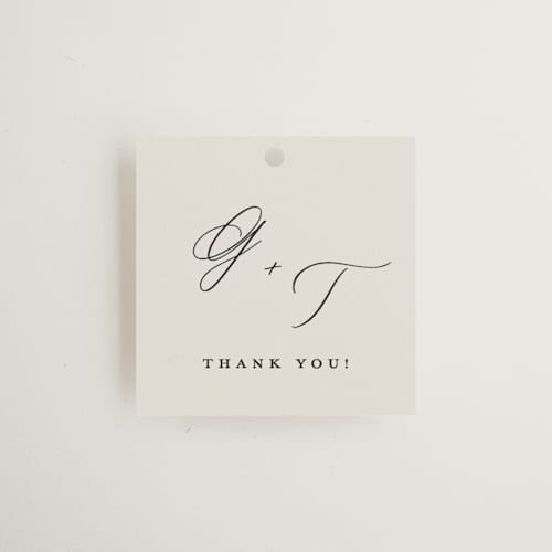 This is a ivory wedding favor tags with standard by Carolyn Nicks called kinkaid printing on signature in tag