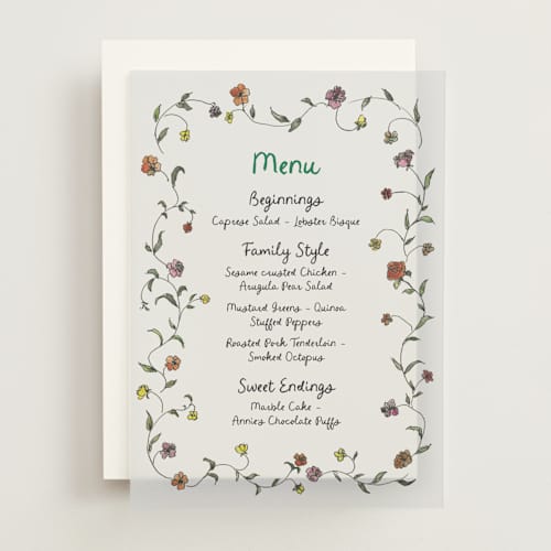 This is a meadow menu cards with standard by Cass Loh called garden's edge printing on translucent vellum in overlay