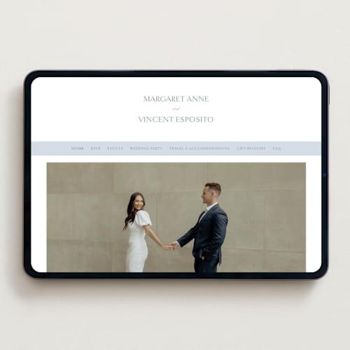 This is a dusty blue wedding websites by Jennifer Postorino called coastal charm printing on digital paper in standard