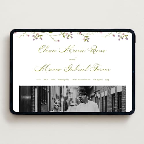 This is a cream wedding websites by Nicole Dragomir called wild berry watercolor printing on digital paper in standard