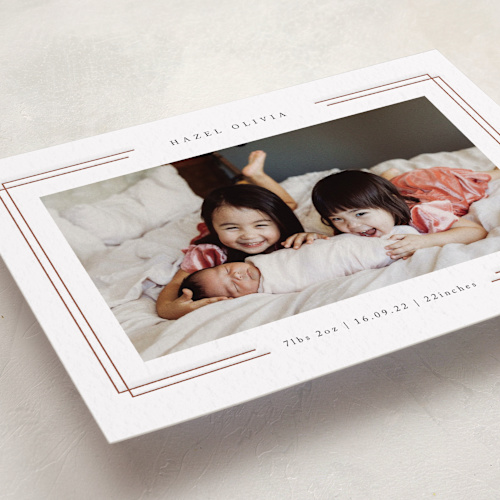 This is a latte letterpress birth announcements with letterpress by Kelly Schmidt called elegant frame printing on bright white letterpress paper in standard