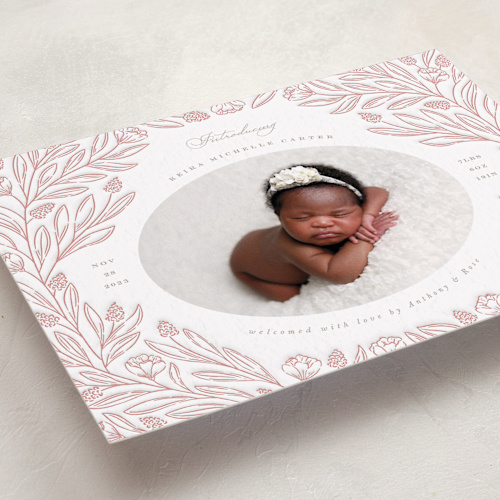 This is a peach letterpress birth announcements with letterpress by Brandy Folse called floral border printing on bright white letterpress paper in standard