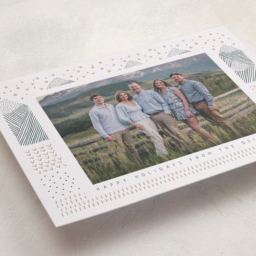 This is a wreath letterpress holiday cards with letterpress by Sabrin Deirani called snow mountains printing on bright white letterpress paper in standard