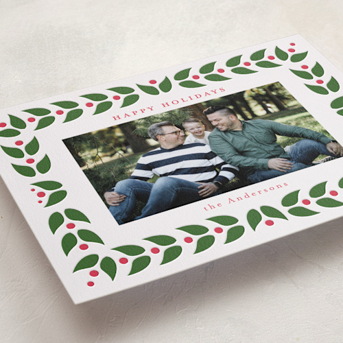 This is a evergreen letterpress holiday cards with letterpress by Jennifer Holbrook called folk leaves and berries printing on bright white letterpress paper in standard