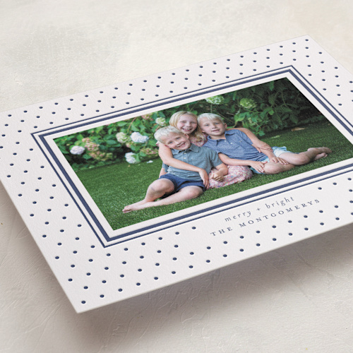 This is a denim letterpress holiday cards with letterpress by Wildfield Paper Co called swiss dot printing on bright white letterpress paper in standard