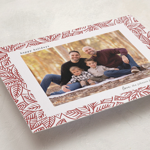 This is a merlot letterpress holiday cards with letterpress by Sarah Renee called line art poinsettias printing on bright white letterpress paper in standard
