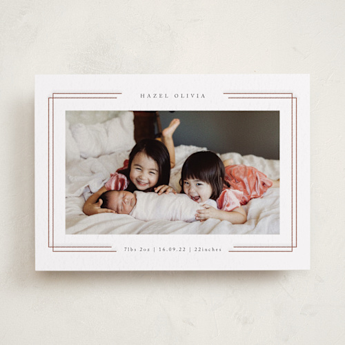 This is a latte letterpress birth announcements with letterpress by Kelly Schmidt called elegant frame printing on bright white letterpress paper in standard