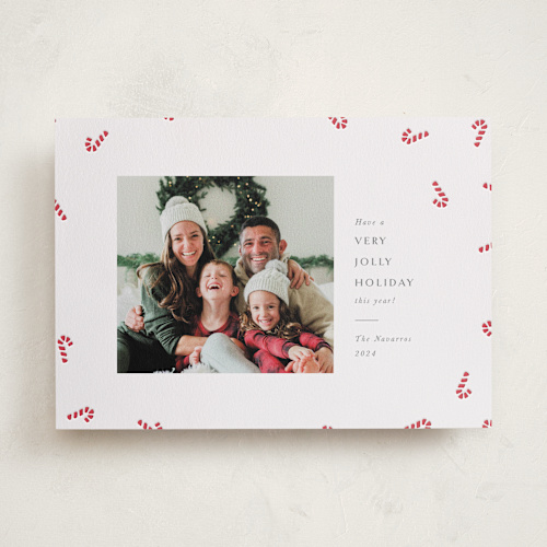 This is a candy cane letterpress holiday cards with letterpress by Meggy Masters called candy cane toss printing on bright white letterpress paper in standard