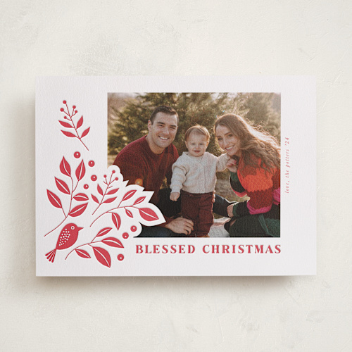 This is a poinsettia letterpress holiday cards with letterpress by Tatjana Koraksic called bird and foliage printing on bright white letterpress paper in standard