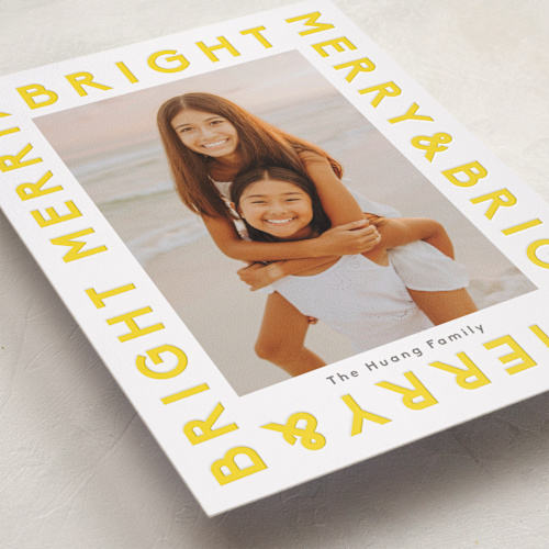 This is a lemon letterpress holiday cards with letterpress by Robin Ott called bright typed printing on bright white letterpress paper in standard