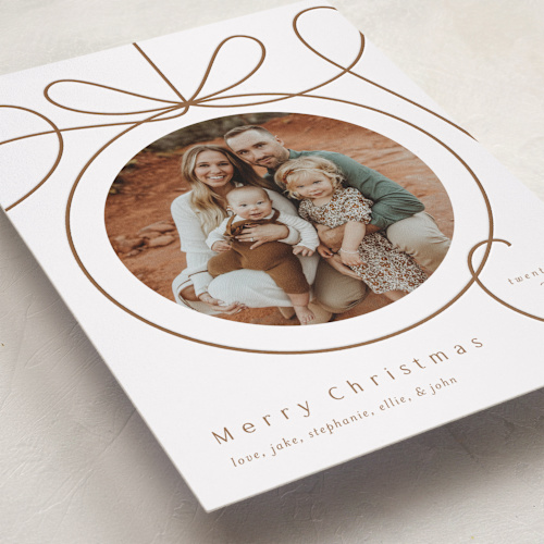 This is a champagne letterpress holiday cards with letterpress by Erin German called ornament frame printing on bright white letterpress paper in standard