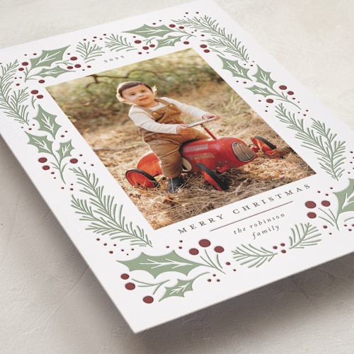 This is a holly berry letterpress holiday cards with letterpress by Wildfield Paper Co called holly berry wreath printing on bright white letterpress paper in standard