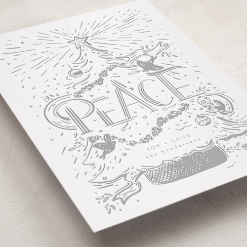 This is a gof letterpress holiday cards with letterpress by Corie Page called peace tree printing on bright white letterpress paper in standard