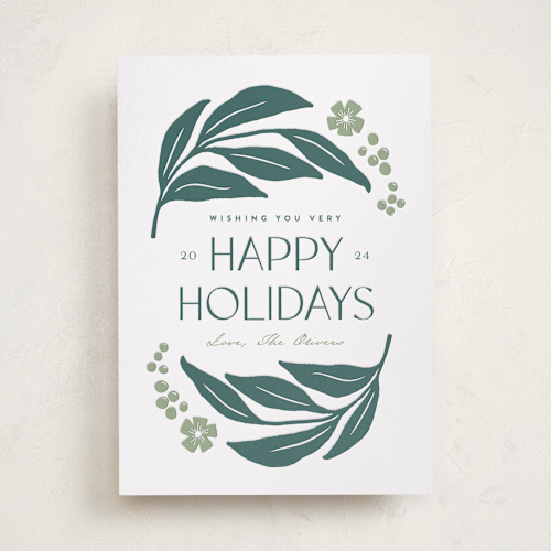 This is a evergreen letterpress holiday cards with letterpress by Carolyn MacLaren called berries and leaves printing on bright white letterpress paper in standard