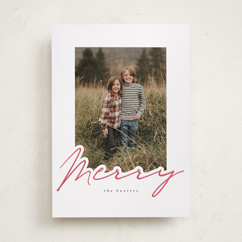This is a snow letterpress holiday cards with letterpress by Angela Garrick called merry in red printing on bright white letterpress paper in standard