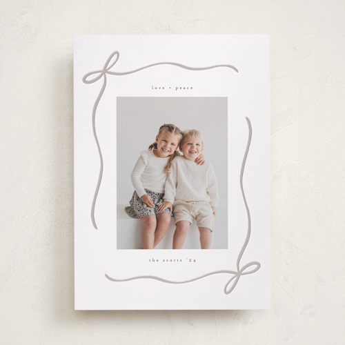 This is a ash letterpress holiday cards with letterpress by chocomocacino called carajillo printing on bright white letterpress paper in standard