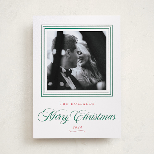 This is a mistletoe letterpress holiday cards with letterpress by Alston Foster called merry love printing on bright white letterpress paper in standard