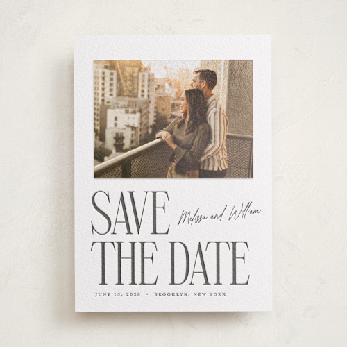 This is a soft black letterpress save the date photo mount cards with letterpress by Ekko Studio called merry stack printing on somerset500 in photo_mount