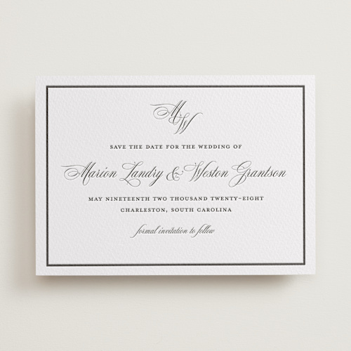 This is a soft black save the date with letterpress by Melinda Denison called royal printing on signature in standard