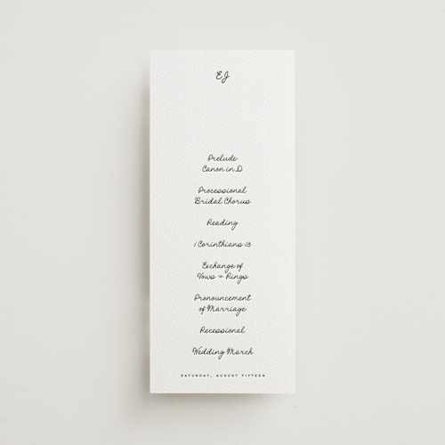 This is a soft black unique wedding programs with letterpress by Blustery August called lover's lantern printing on somerset500 in 4x9
