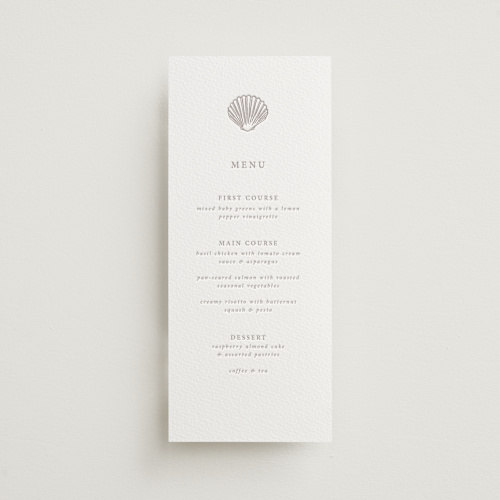 This is a dove grey menu cards with letterpress by Hannah Bowman called simple seashell printing on somerset500 in standard