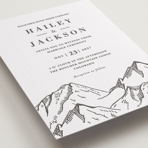 This is a soft black letterpress wedding invitations with letterpress by Winston Latchman called etched mountain printing on somerset500 in standard