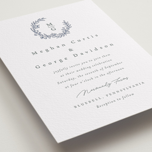 This is a stone letterpress wedding invitations with letterpress by Katherine Moynagh called wreathed monogram printing on somerset500 in standard