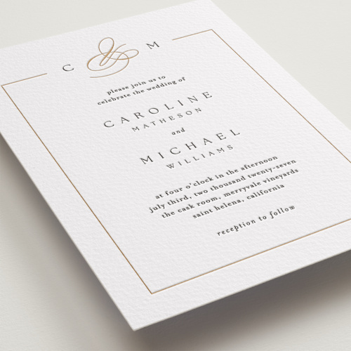 This is a faux gold letterpress wedding invitations with letterpress by Kelly Schmidt called framed monogram printing on somerset500 in standard