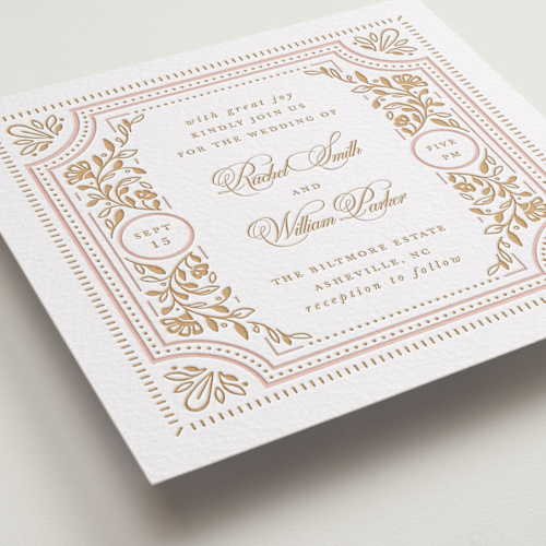 This is a faux gold letterpress wedding invitations with letterpress by Mansi Verma called ornate frame printing on somerset500 in standard