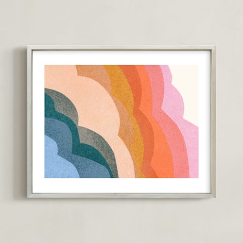This is a rainbow kids wall art by Carrie Moradi called rainbow clouds