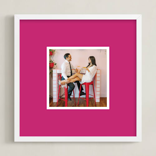 This is a pink photo art by Minted called color border: square framed photo