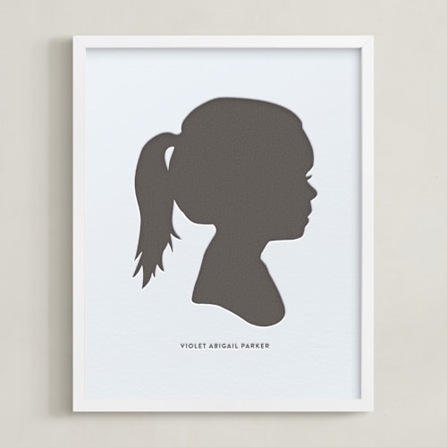 This is a black silhouette art by Minted called custom silhouette letterpress art