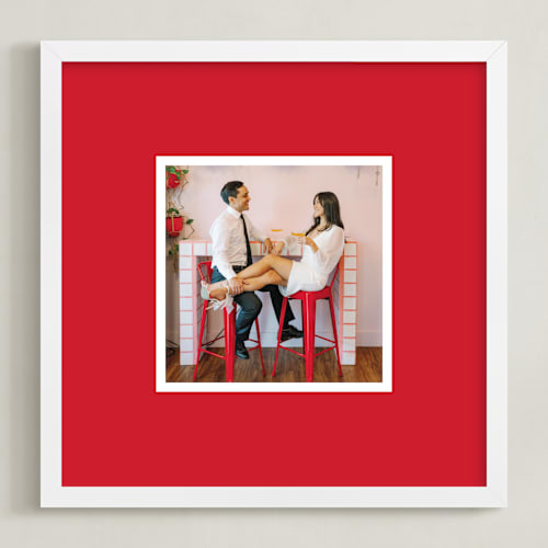 This is a red photo art with standard by Minted called color border: square framed photo