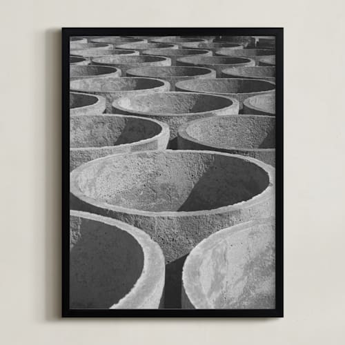 This is a stone art by Alaric Yanos called concrete cylinders