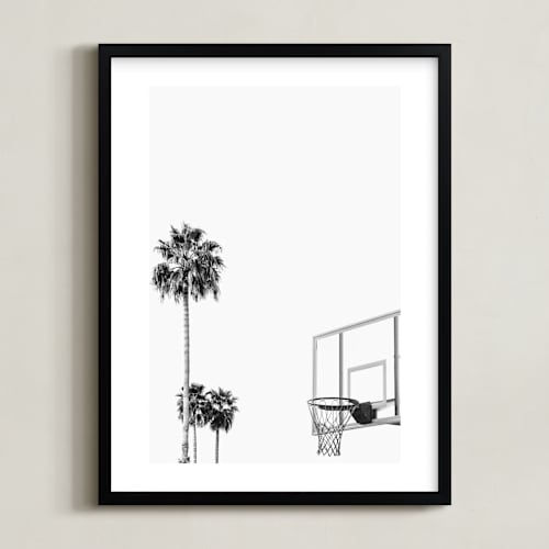 This is a white art by Irene Suchocki called hoops and palms