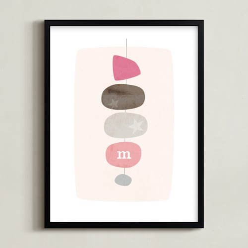 This is a pink nursery wall art by Stacey Meacham called mid-century monogram