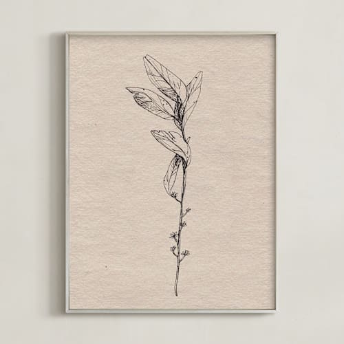 This is a brown paper art by Andrea Rose called dancing branches