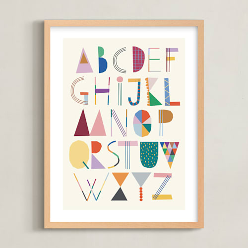 This is a rainbow kids wall art by lulu and isabelle called the most colorful alphabet